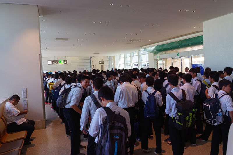 Japan-Okinawa-Fukuoka-Airport - Here is the line of school kids for security. It took forever. They were not on my flight but I presume the flight they were on was as horrific as the