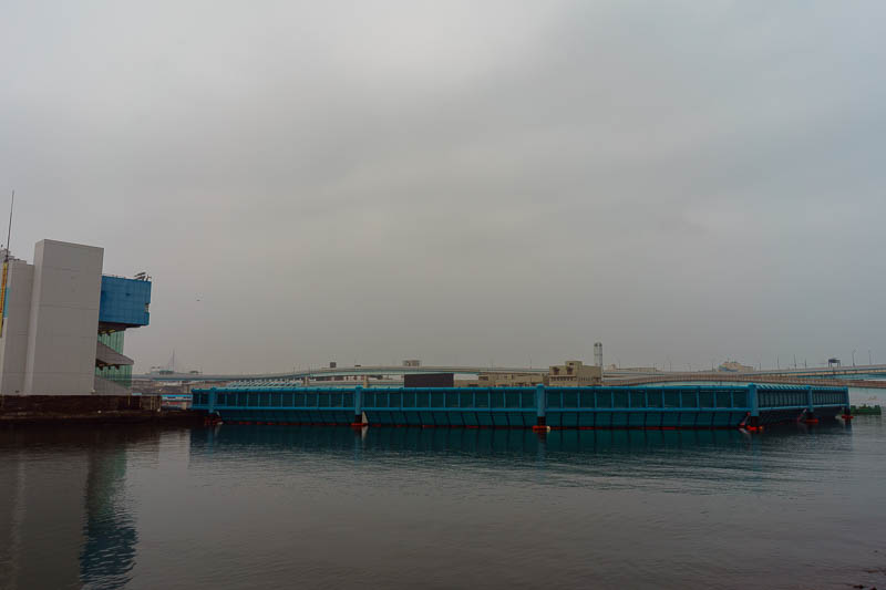 Of course I am back in Japan yet again - Oct and Nov 2018 - I headed down to the docks. This blue thing is the floating protective barrier of a mini speedboat racing stadium! The stadium seating section appears
