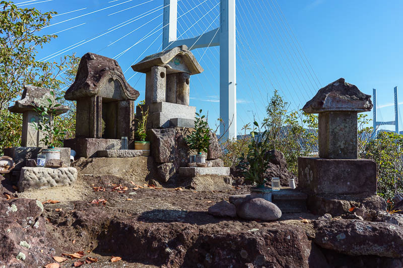 Of course I am back in Japan yet again - Oct and Nov 2018 - Its a shrine, and the bridge lurking behind it. I like to presume the shrine exists to appease the earthquake gods into not destroying the bridge.