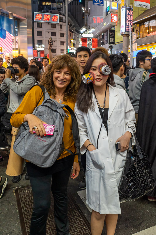 Japan-Tokyo-Shibuya-Halloween - Can head and a foreign woman.