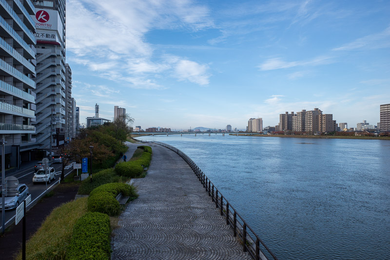Japan-Niigata-Toyano Lagoon - A view down the Shinano river from the city side. Not a lot to see.