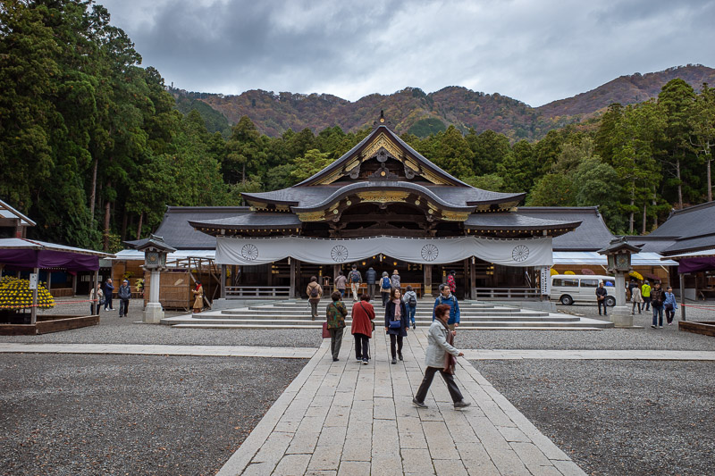 Japan for the 9th time - Oct and Nov 2019 - Finally after hiking through displays of flowers for about 2 weeks I got to the shrine. I would walk along all those mountains behind it.