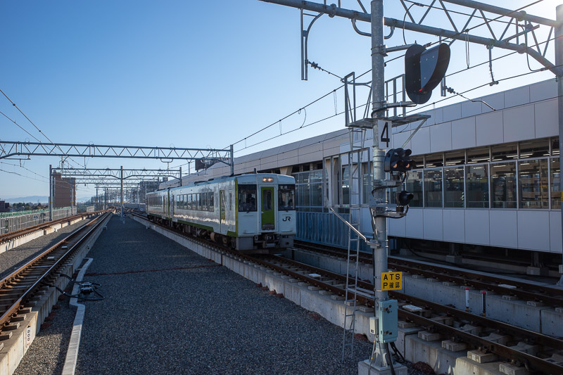 Japan-Niigata-Yamagata-Train - Here comes my small train to collect me. Its features included, a volcanic heating system powered by pure lava, a squatter toilet, and a lot of rubbis