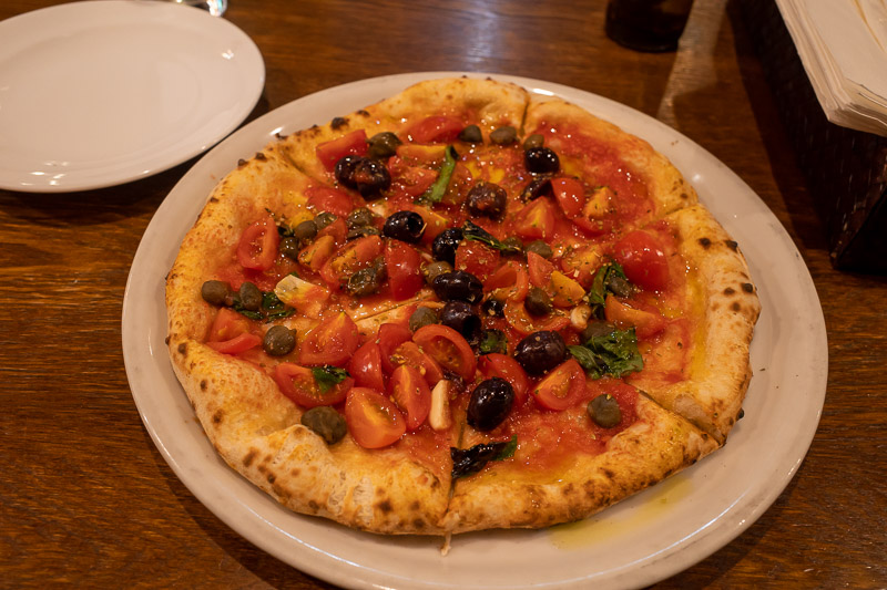 Japan-Yamagata-Food-Pizza - And here is my pizza, sans cheese, but with olives capers and tomatoes. I dont eat much meat because not eating meat offsets the carbon from my half w