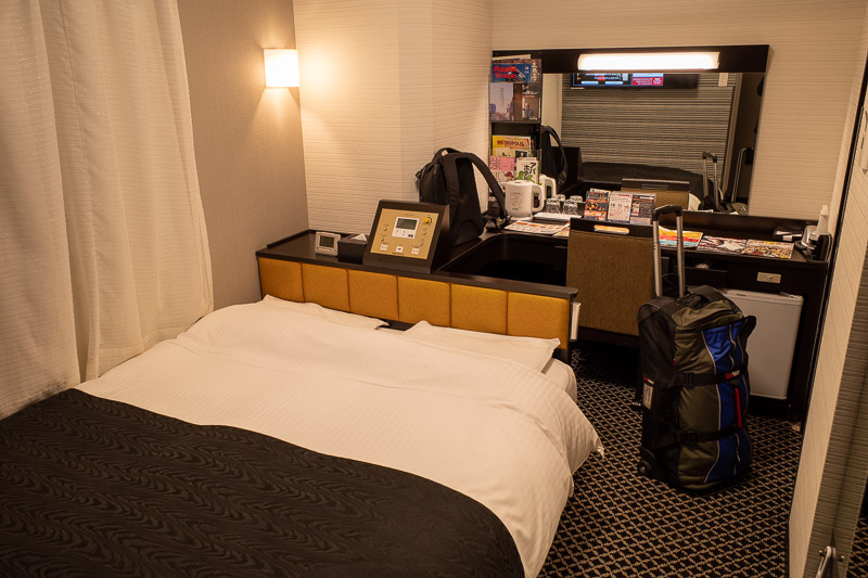 Japan for the 9th time - Oct and Nov 2019 - And heres my last boring APA hotel photo of this trip. It is a weird setup, the bed is backwards with a bar area behind it. The TV is behind where I s