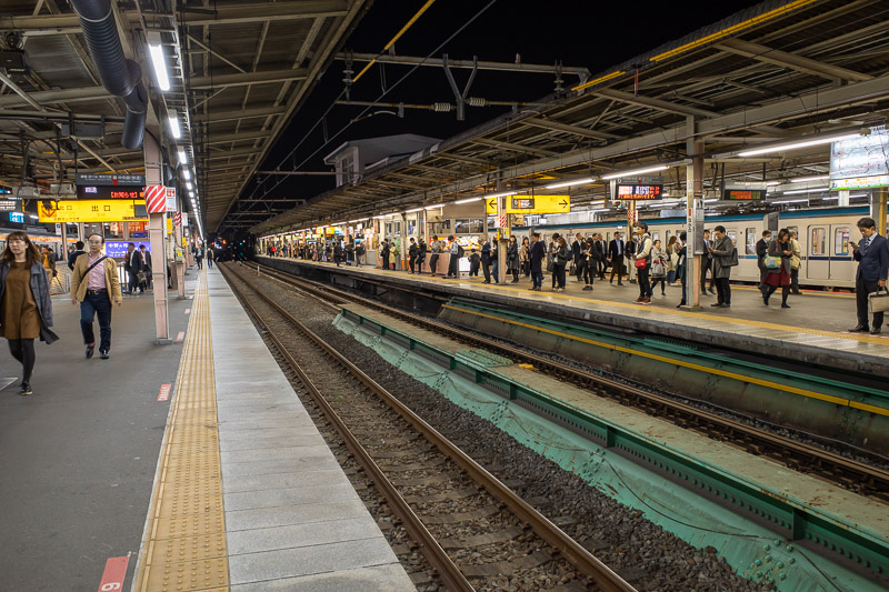 Japan-Tokyo-Nakano-Curry - Here is tonights shot of a train platform. Night versions are generally more interesting than day versions. Although this mornings had nice clouds.