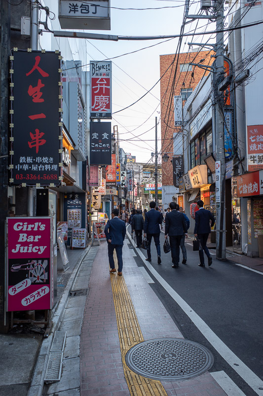 Japan for the 9th time - Oct and Nov 2019 - Here is one of the alleyways of Takanodababa, a fun place name to say. featuring identically dressed business men.