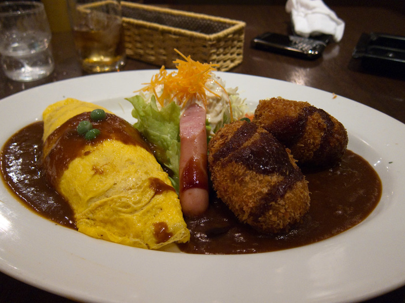 Japan-Osaka-Omurice-Umeda Sky - In the basement theres a fake ancient Japan restaurant street. I decided to have a typical bar meal, a rice omelette with potato croquette things. The