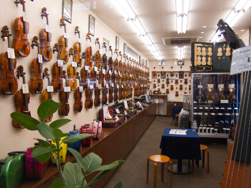 Japan-Tokyo-Shinjuku-Neon - This is just a random shop that sells nothing except violins. Theres many levels of violins.