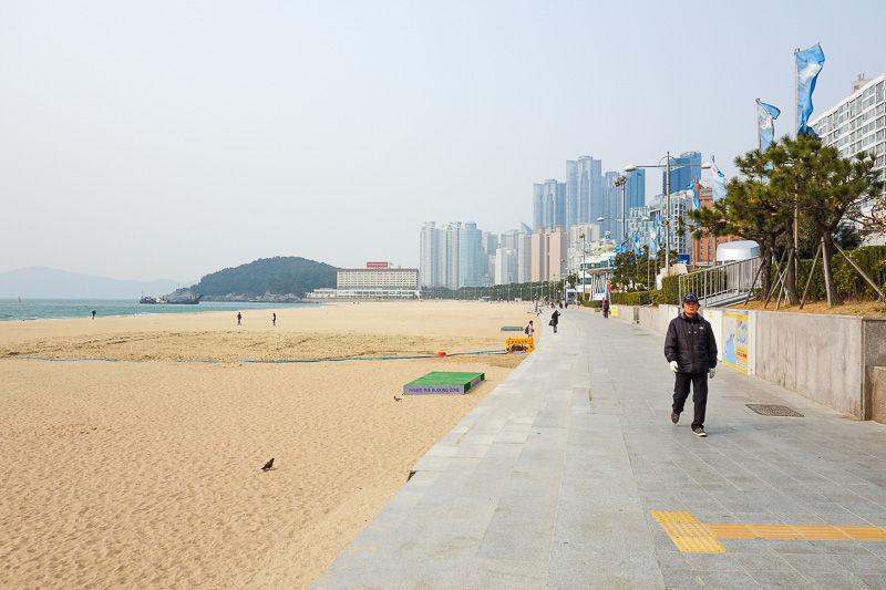 Korea-Busan-Beach-Haeundae - Looking along the beach back towards another part of Busan. Yesterday when I was looking down at the city on my many ridges ridge walk, I could not se