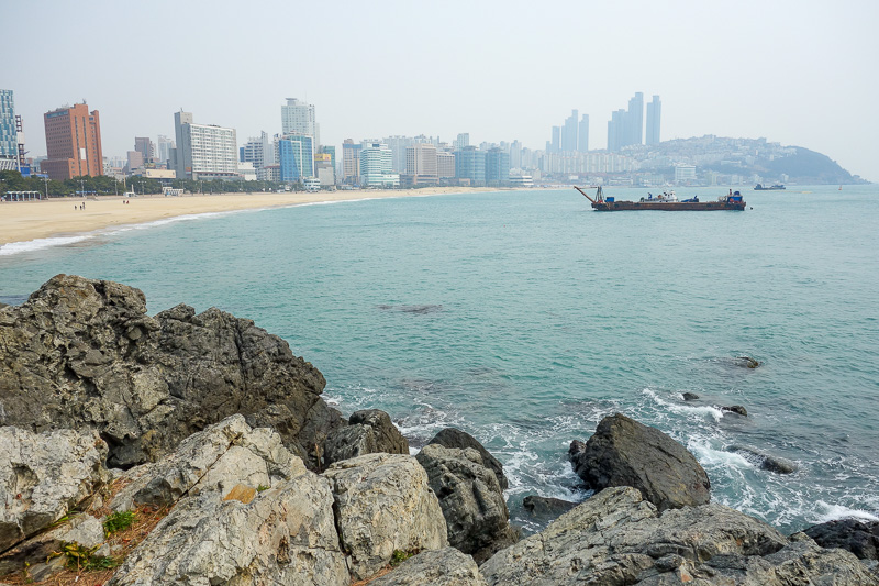 Korea again - Incheon - Daegu - Busan - Gwangju - Seoul - 2015 - And looking back in the other direction, from the island thats not an island. The ships are doing stuff with the sand. Those tall buildings on the cli