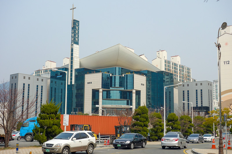 Korea-Busan-Beach-Haeundae - This is the local massive catholic church, in a wealthy area as we are by the beach and the yacht club. It is much bigger than the picture suggests, T