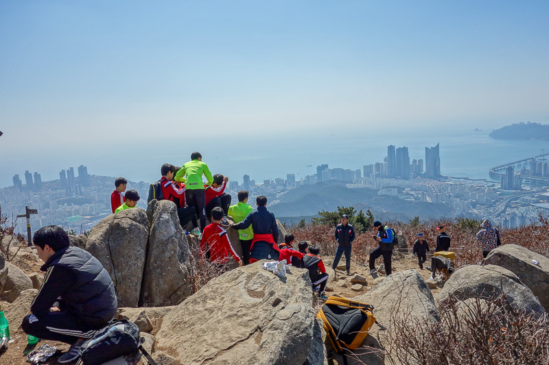 Korea-Busan-Hiking-Hwangnyeongsan - And now I am at the top. With the greatest view ever. These guys were extremely happy to be here. Nice clear day.