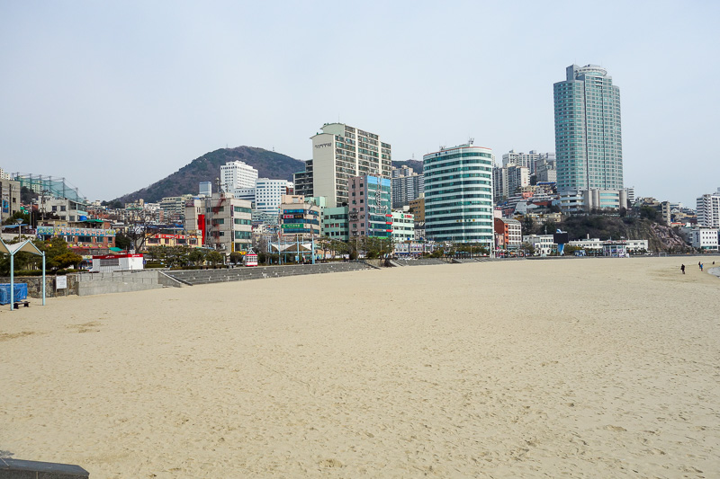 Korea-Busan-Beach-Songdo - Just another view of the beach and the thousands of happy people building sand castles and splashing in the cool South China sea.
