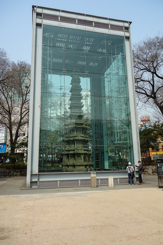 Korea again - Incheon - Daegu - Busan - Gwangju - Seoul - 2015 - Nearby is a genuine ancient pagoda. So genuine that it needs to be in a giant glass case. Most genuine things in Asia are genuine re creations.