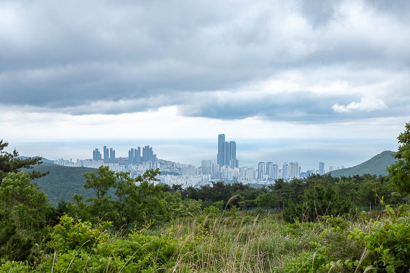 Korea-Busan-Hiking-Jangsan - A view from nearly half way. The Ocean looks very still. Those 3 large buildings are Haeundae beach from the day before yesterday.