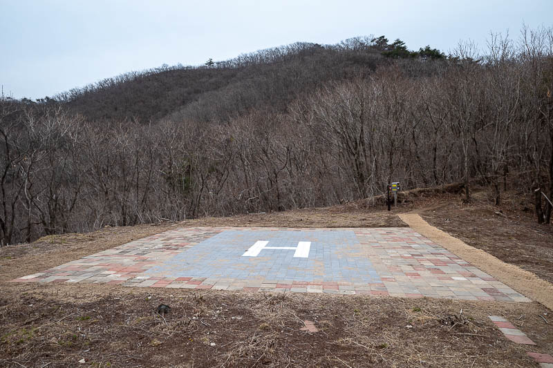 Korea-Daegu-Hiking-Palgongsan-Gatbawi - I think this was the 3rd helicopter landing area of the journey, but this one looks well maintained, the H is recently painted.