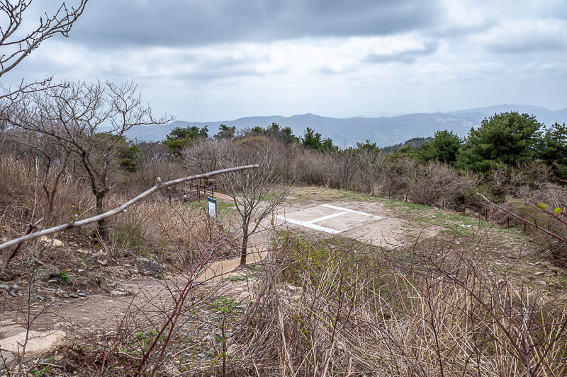 Korea-Gyeongju-Hiking-Bulguksa-Tohamsan - Today's helicopter landing pad. They would really struggle to land in the wind today. It was windy enough that taking photos was difficult, so no self
