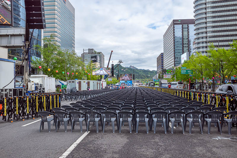 Korea-Seoul-Hongdae - But don't worry, the main road is setting up for a protest today. You can see all the hung speaker arrays like you would see at a stadium concert. The