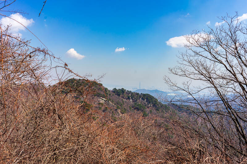 Korea-Seoul-Hiking-Cheonggyesan - If you squint really hard at the middle of this shot you can see the Lotte tower, where I went on the morning I arrived here after not sleeping on my 