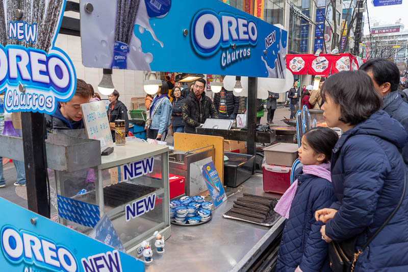 Korea-Seoul-Myeondong-Shopping - Coming soon to Australia, Oreo Churros. Those adult children have emerged from their cage with wheels to line up and get a bucket full of fried chocol