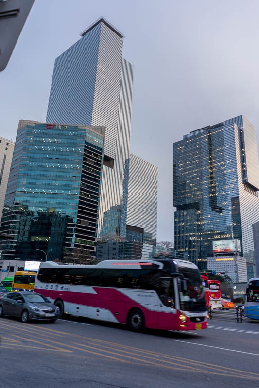 Korea - HK - China - KORKONG! - Heres some nice buildings, and a bus.
