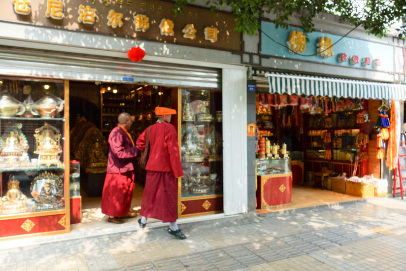 Sichuan - China - Chengdu - Chongqing - March 2013 - Monks shopping for crap.