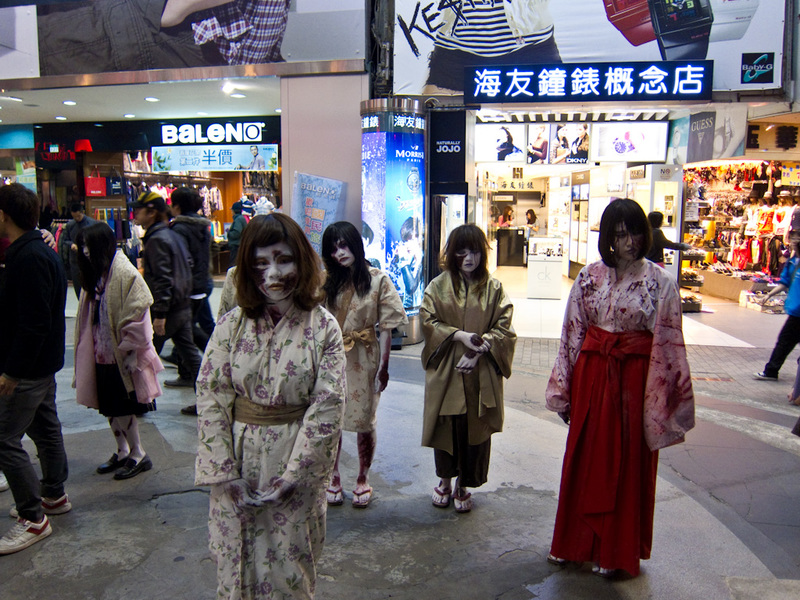 Taiwan-Taipei-Ximending-Taipei - OK, its time for Zombie cosplay geisha girls. They sort of sway slowly like zombies. They dont do anything else.