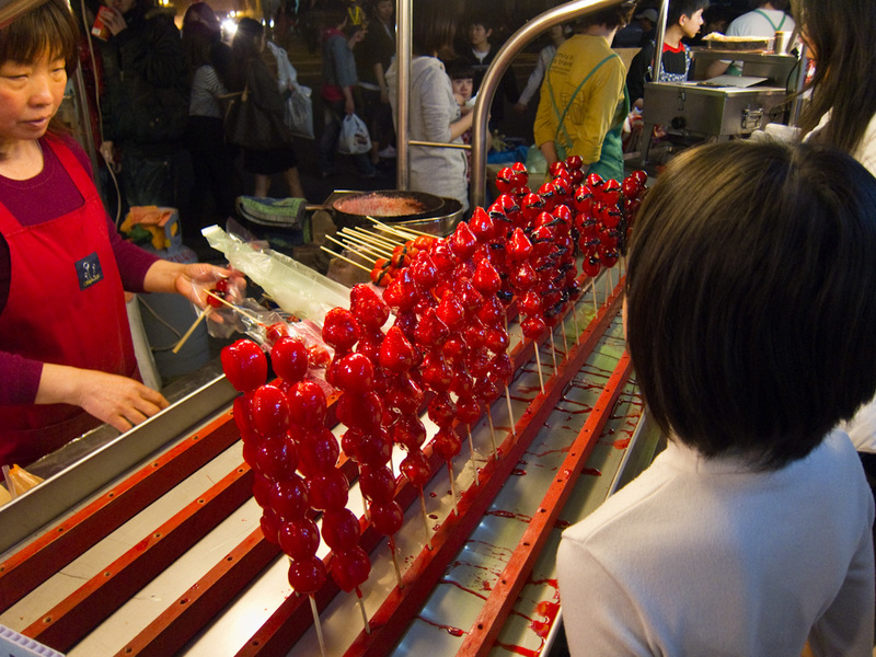 Taiwan-Taipei-Night Market-Shilin - Final dessert, was these strawberries that have been toffee'd (is that a word?). They were delicious, they do tomatoes as well, who wants a toffee tom