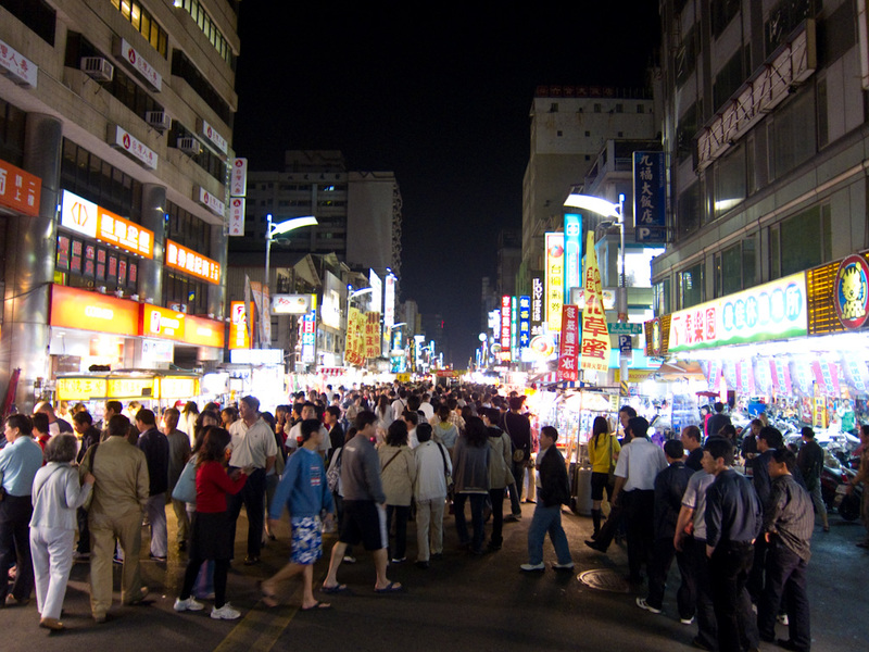 Taiwan / Hong Kong / Singapore - March/April 2011 - And this is the night market. It goes on like this for at least 2km. The sign says it closes at 5am, during the day its a very busy road. This is not 