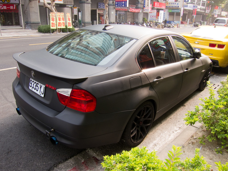 Taiwan-Kaohsiung-Bullet Train - This BMW is completely covered in Carbon Fibre vinyl, with red badges, blue exhaust pipes etc. I havent really seen any other car culture stuff in all