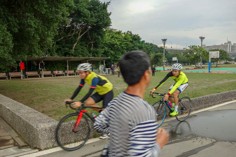 A full lap of Taiwan in March 2017 - However I did manage to time a photo to simultaneously catch a jogger, cyclists, and old folks playing croquet. That takes a lot of skill, you should 