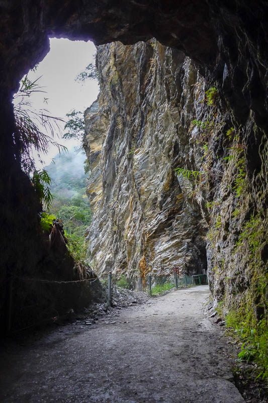 A full lap of Taiwan in March 2017 - The signs warning about rock fall were particularly severe between these two tunnels. Advising people to run between them. They should probably erect 