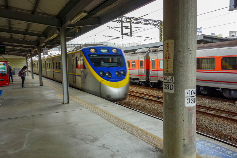A full lap of Taiwan in March 2017 - Here comes my train to Tainan. Despite being a slow local train, they have attached a sleek modern locomotive to the front. The carriages were a hybri