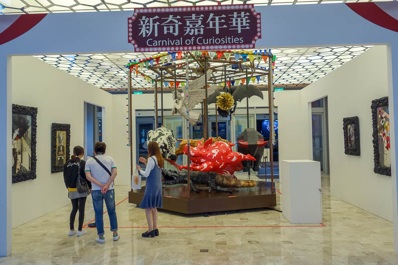 Taiwan-Tainan-Department Store-Omurice - It was now late, for me, but I still had time to appreciate the carnival of curiosities on the way out. I sat on the pig on the merry go round until s
