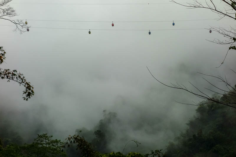 Taiwan-Sun Moon Lake-Rain - I was now confused which way that ropeway goes, its very high above my head! An earthquake right now would make their day exciting.