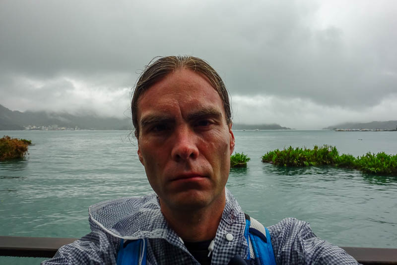 Taiwan-Sun Moon Lake-Rain - And now I was almost back, time to remove my hood and take a photo. It was almost not raining at this point! I look very sweaty, and old. So damn old.