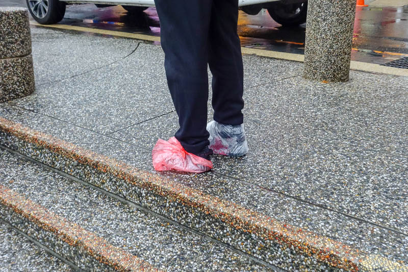 Taiwan-Sun Moon Lake-Rain - This guy is taking his shoes seriously.
