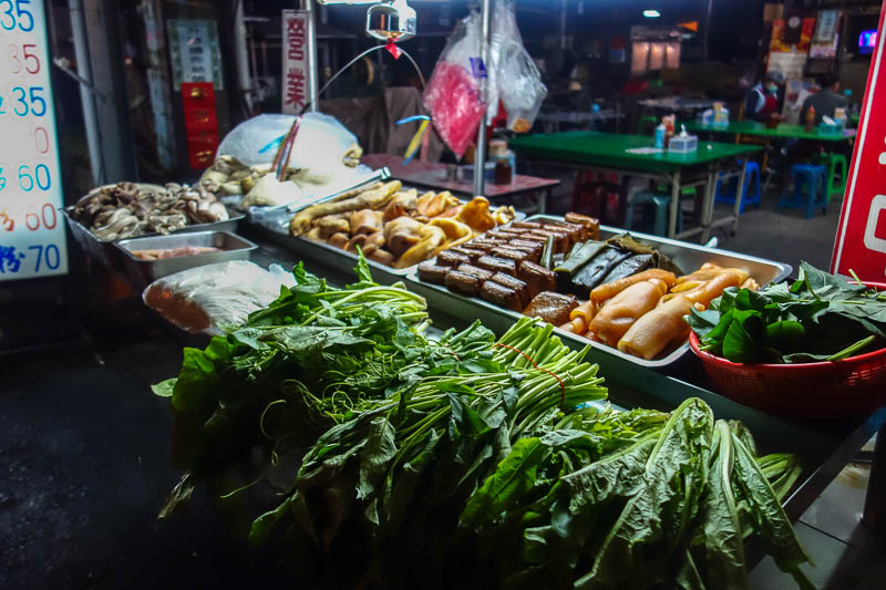 A full lap of Taiwan in March 2017 - Here is the only food stand at the night market, currently unattended. You select what you want and they put it in a pot and boil it for a while. A pi