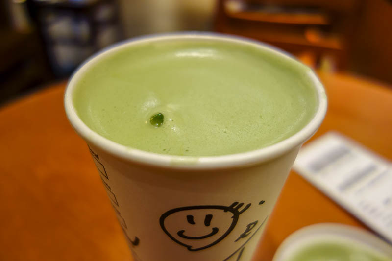 Taiwan-Taipei-Rain-Food-Vegetarian - When trapped indoors I am not above taking photos of my starbucks matcha tea latte. I note it has a smiley face. I always get a smiley face instead of